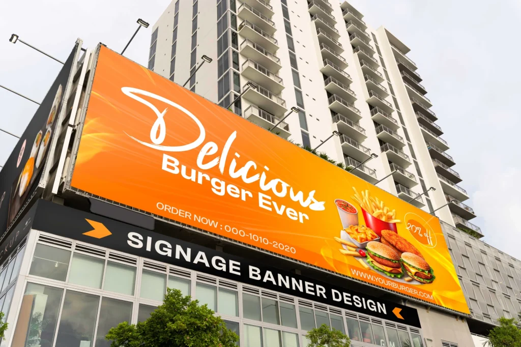 Bannière publicitaire géante pour un restaurant de burgers, posée sur la façade d'un immeuble